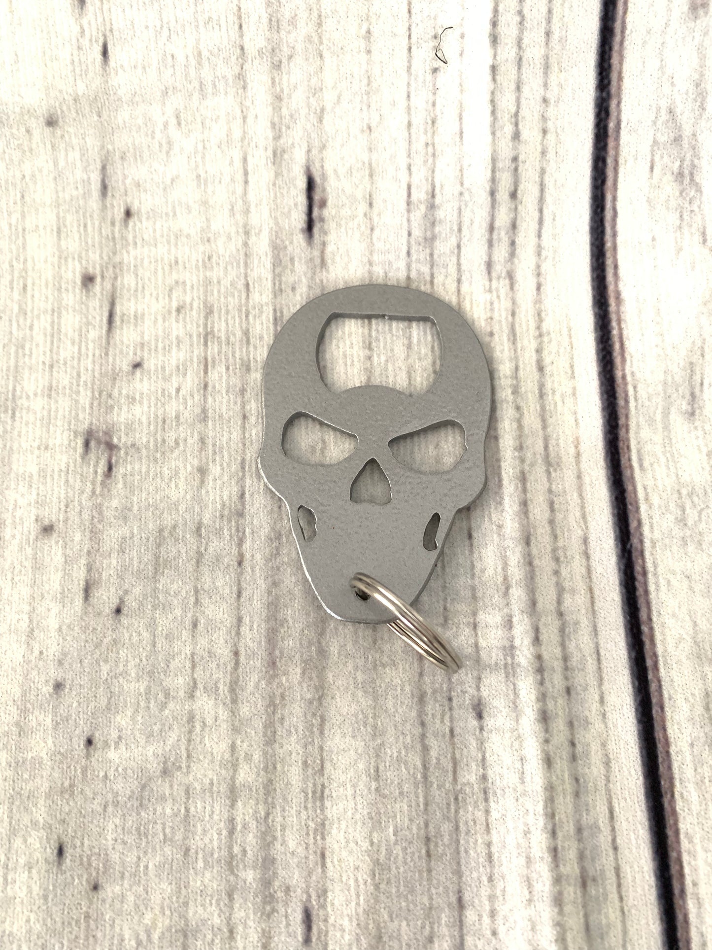 Skull shaped keychain bottle opener